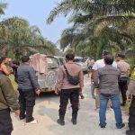 Polisi-Berjaga-Dilokasi-Bentrokan-Antar-Dua-Kelompok-di-Kuansing.-(Dok.-Riau-Aktual)